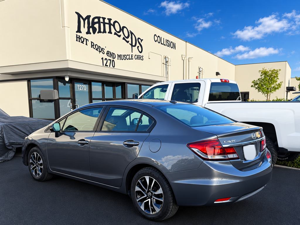 Gray Honda Civic sedan parked outside Mahood's