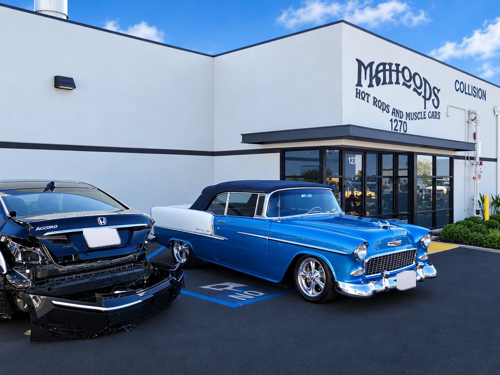 Damaged sedan and a blue and white classic Chevy parked outside Mahood's at 1270 N. Lance Ln.