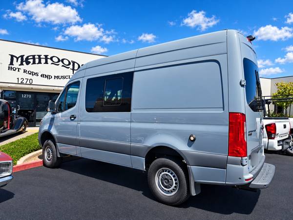 Gray Mercedes Sprinter van outside Mahood's